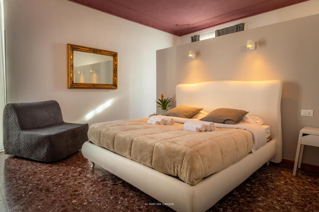 Postel nebo postele na pokoji v ubytování Bella Vista Rooms