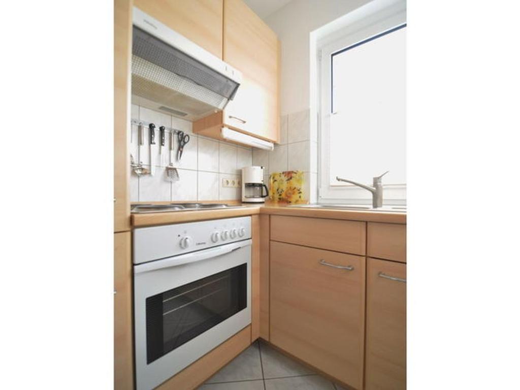 Kuchyň nebo kuchyňský kout v ubytování Ferienwohnung Duenenweg _ Haase