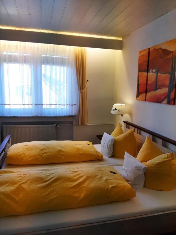 Postel nebo postele na pokoji v ubytování Hotel Irene
