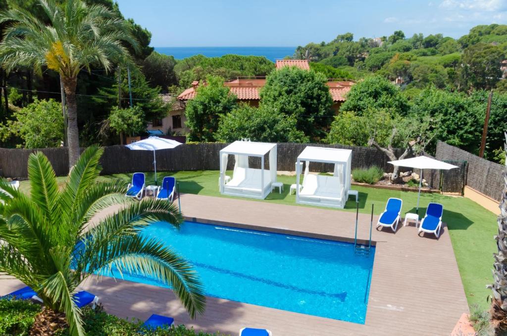 an image of a swimming pool in a villa at Club Villamar - Fedora in Lloret de Mar