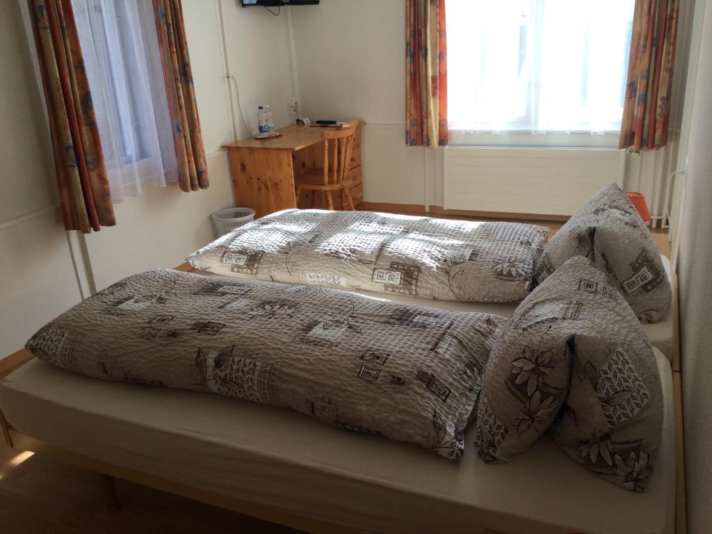 Postel nebo postele na pokoji v ubytování Hotel Restaurant Raben