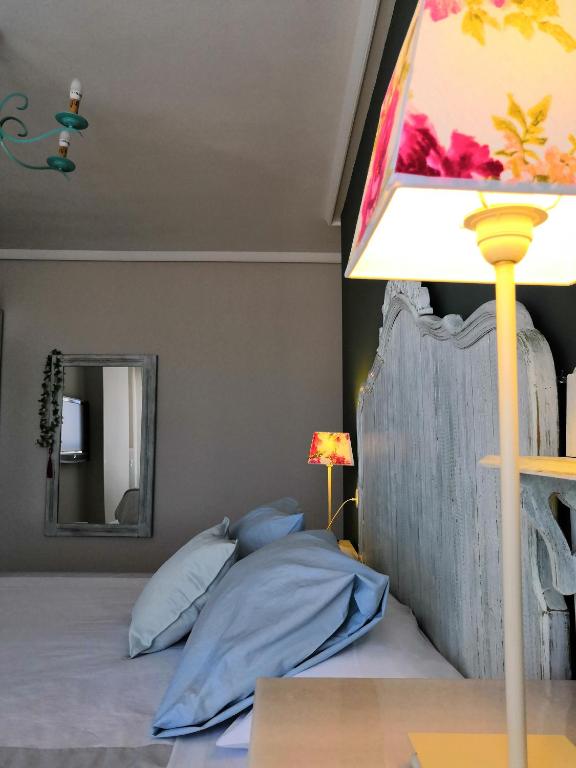 Postel nebo postele na pokoji v ubytování La Parada Sant Domingo 1
