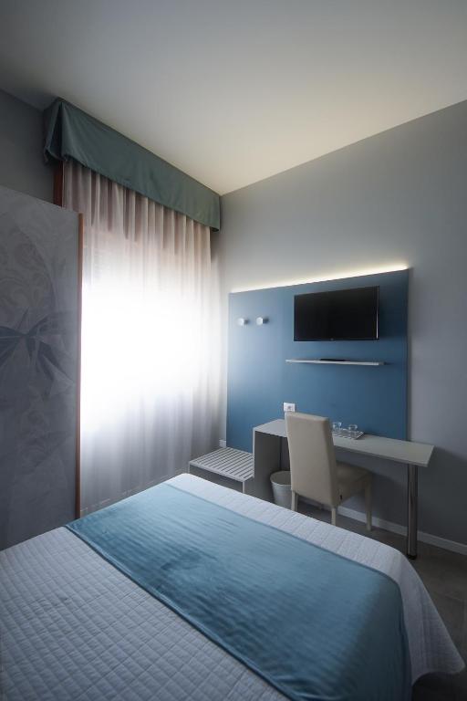 Postel nebo postele na pokoji v ubytování Hotel Master