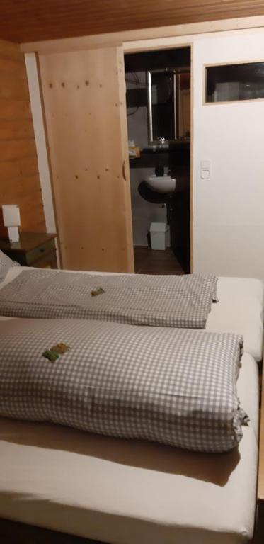 Postel nebo postele na pokoji v ubytování Pension Hirsch