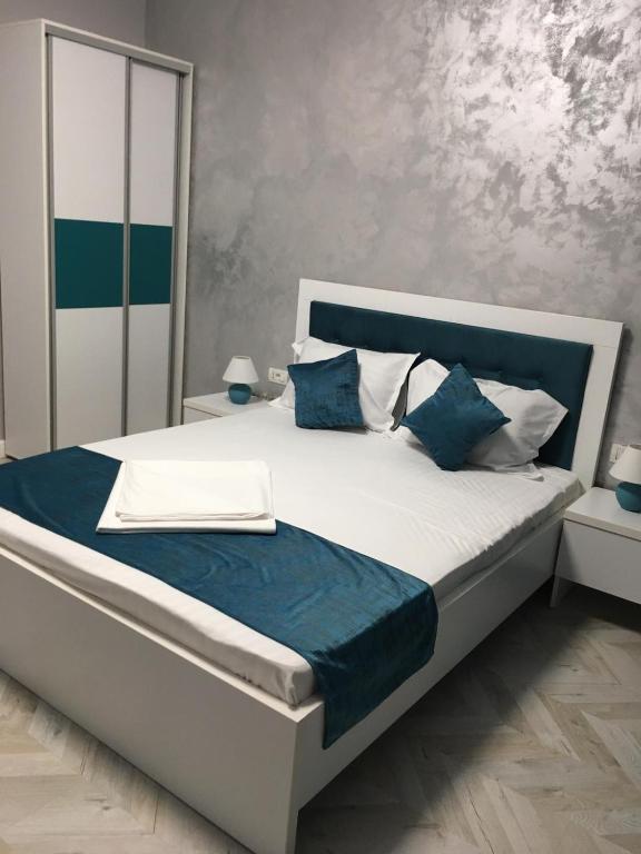Postel nebo postele na pokoji v ubytování Villa George