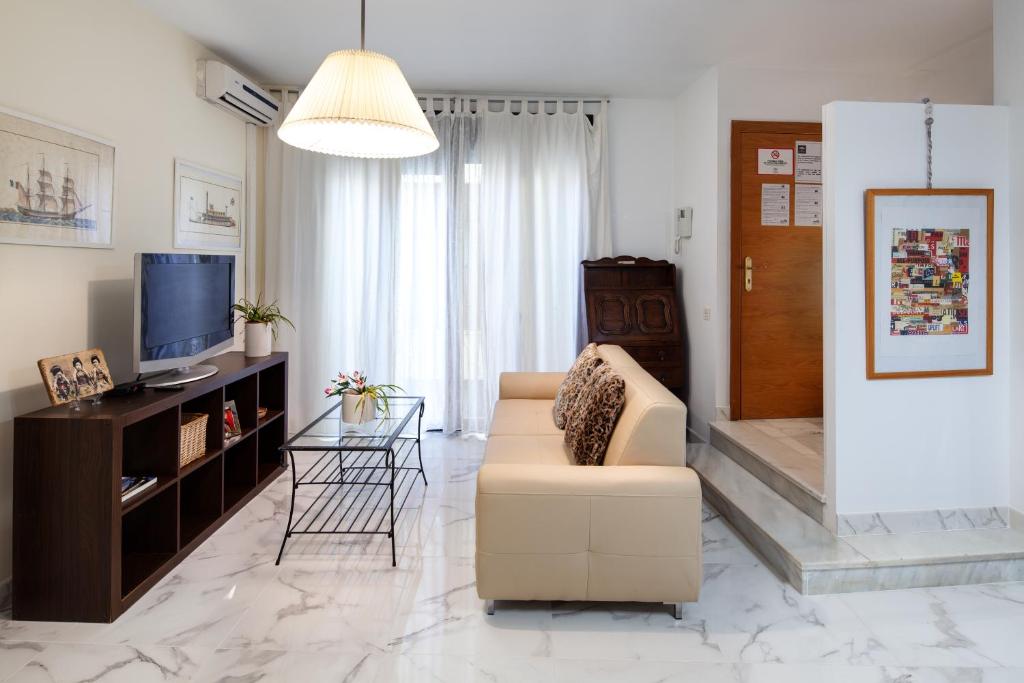 TV a/nebo společenská místnost v ubytování Peña 5 Apartments