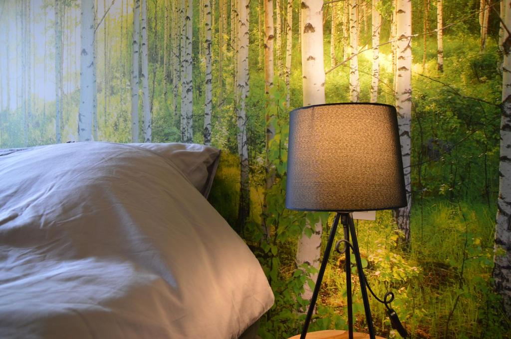 Postel nebo postele na pokoji v ubytování B&B Tantine