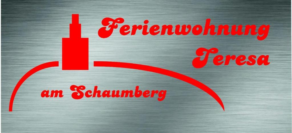 Una flecha roja con las palabras recordando la fiebre y el séptimo. en Ferienwohnung Teresa en Tholey