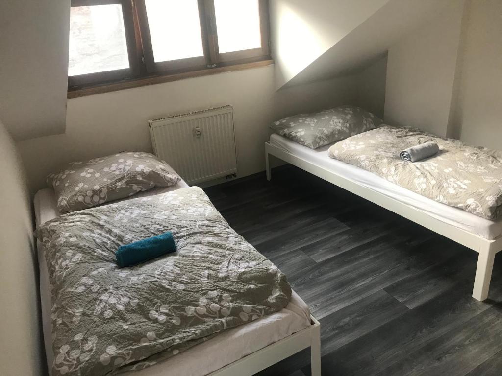 Postel nebo postele na pokoji v ubytování Old Town Apartments S12