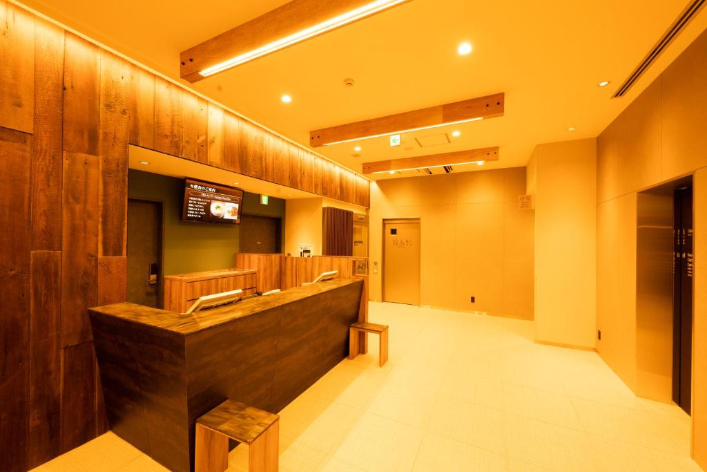 The lobby or reception area at global cabin Yokohama Chukagai