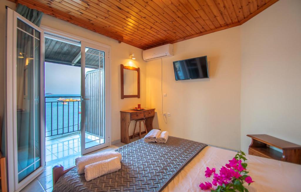 Posteľ alebo postele v izbe v ubytovaní Aggelika Apartments