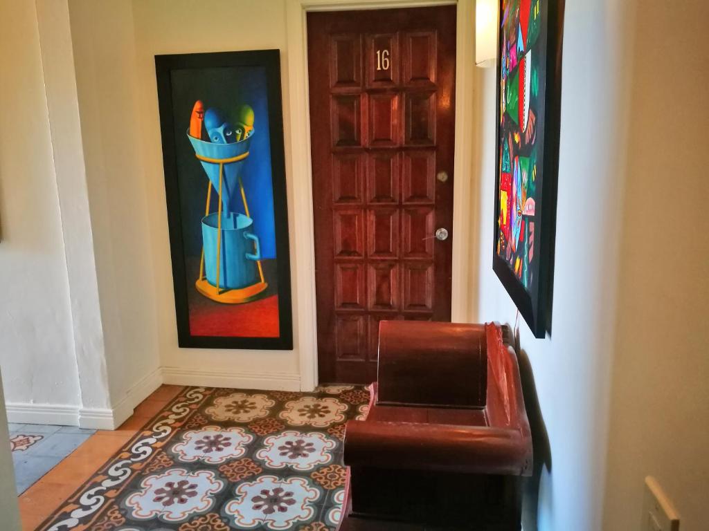 Postel nebo postele na pokoji v ubytování Hotel Casa 69