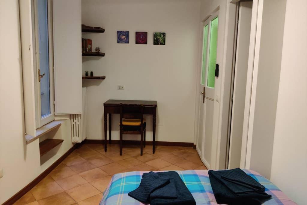 A bed or beds in a room at Lanza Tomasi Apartment - centre