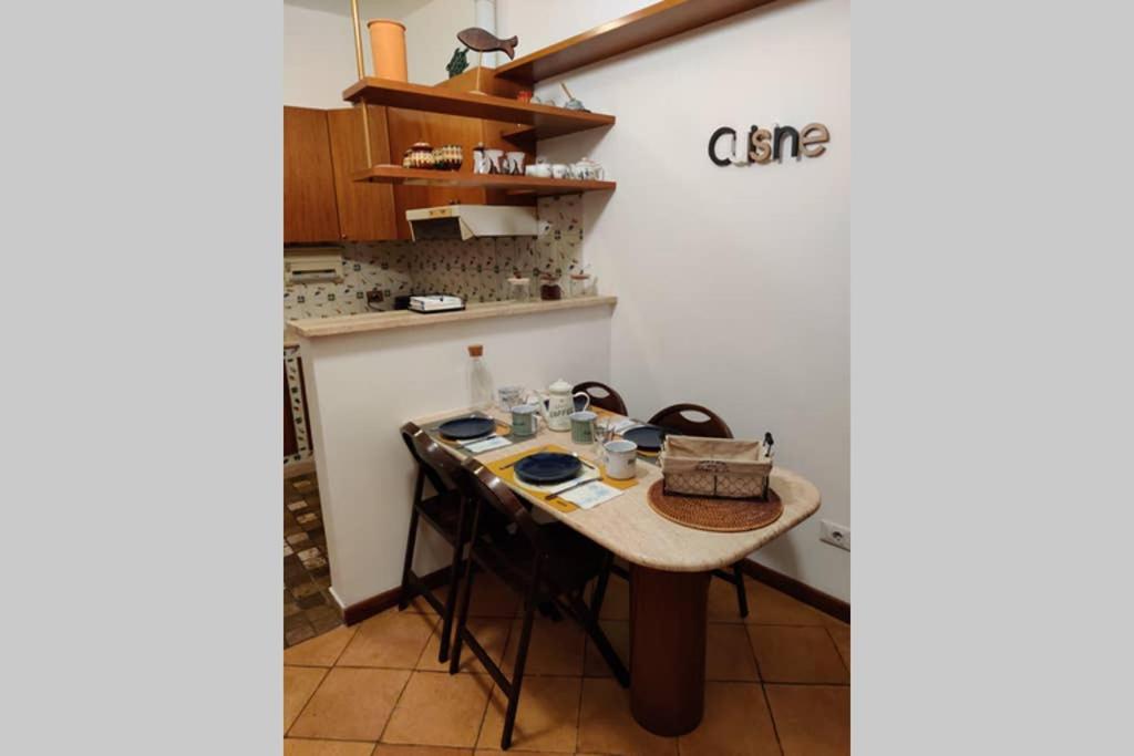 A kitchen or kitchenette at Lanza Tomasi Apartment - centre
