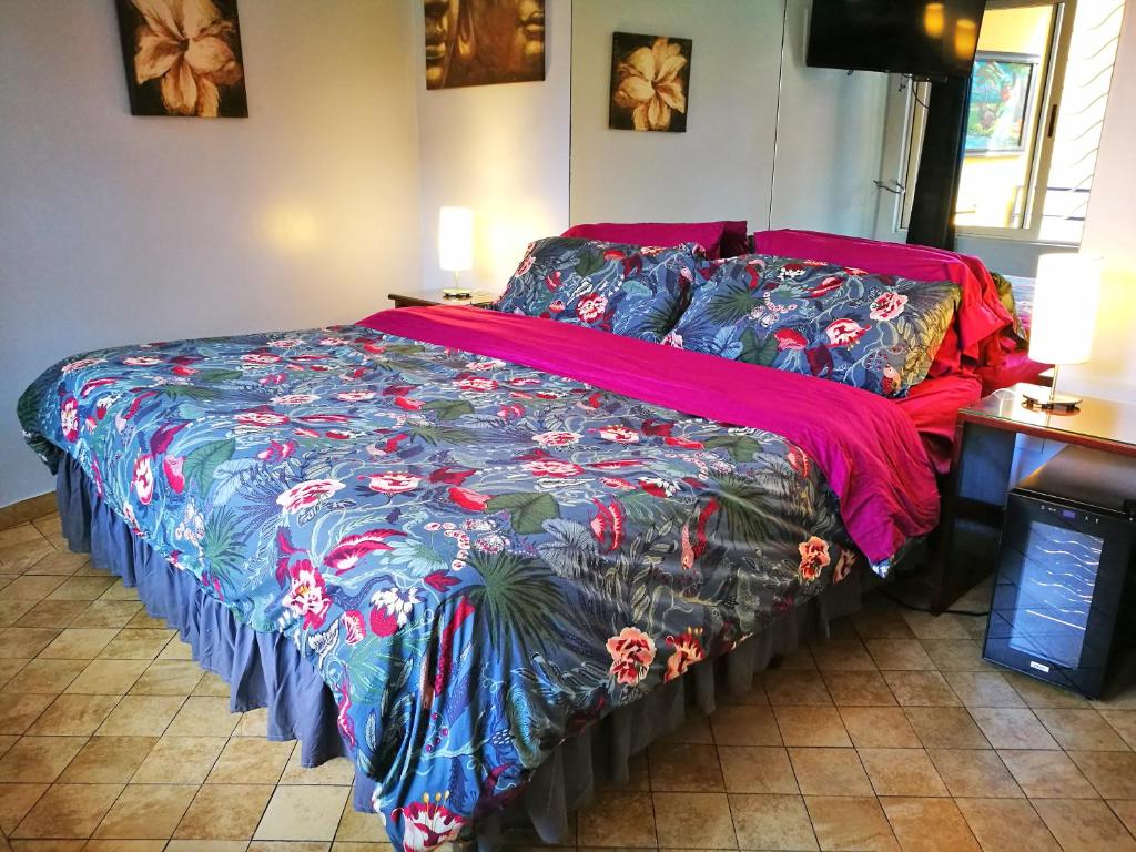 Postel nebo postele na pokoji v ubytování Hotel Casa 69