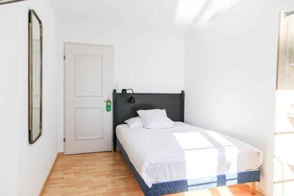 Postel nebo postele na pokoji v ubytování Hotel Hirschen am See