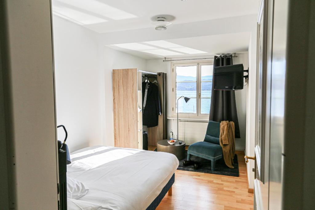 Postel nebo postele na pokoji v ubytování Hotel Hirschen am See