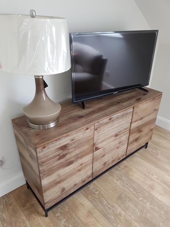 TV a/nebo společenská místnost v ubytování Cong Getaway Lodge