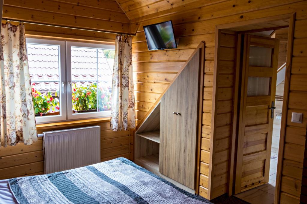 Postel nebo postele na pokoji v ubytování Agroturystyka u Jarka