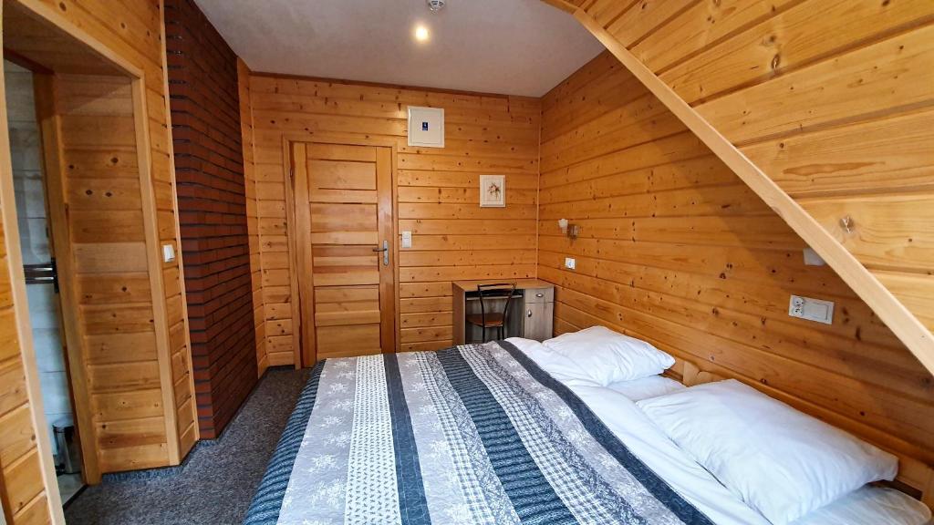 Postel nebo postele na pokoji v ubytování Agroturystyka u Jarka