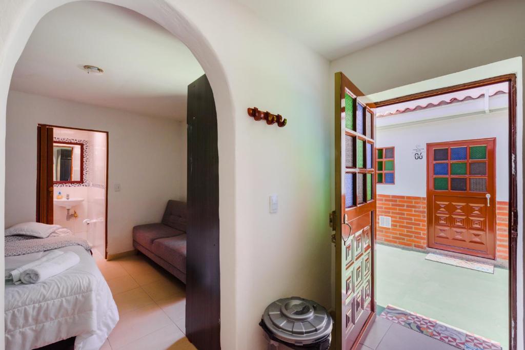 Postel nebo postele na pokoji v ubytování Hostal Doña Eliza