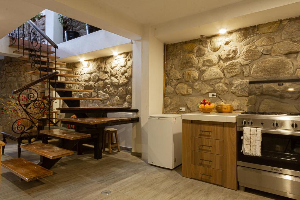 Kuchyň nebo kuchyňský kout v ubytování Luna House Cusco
