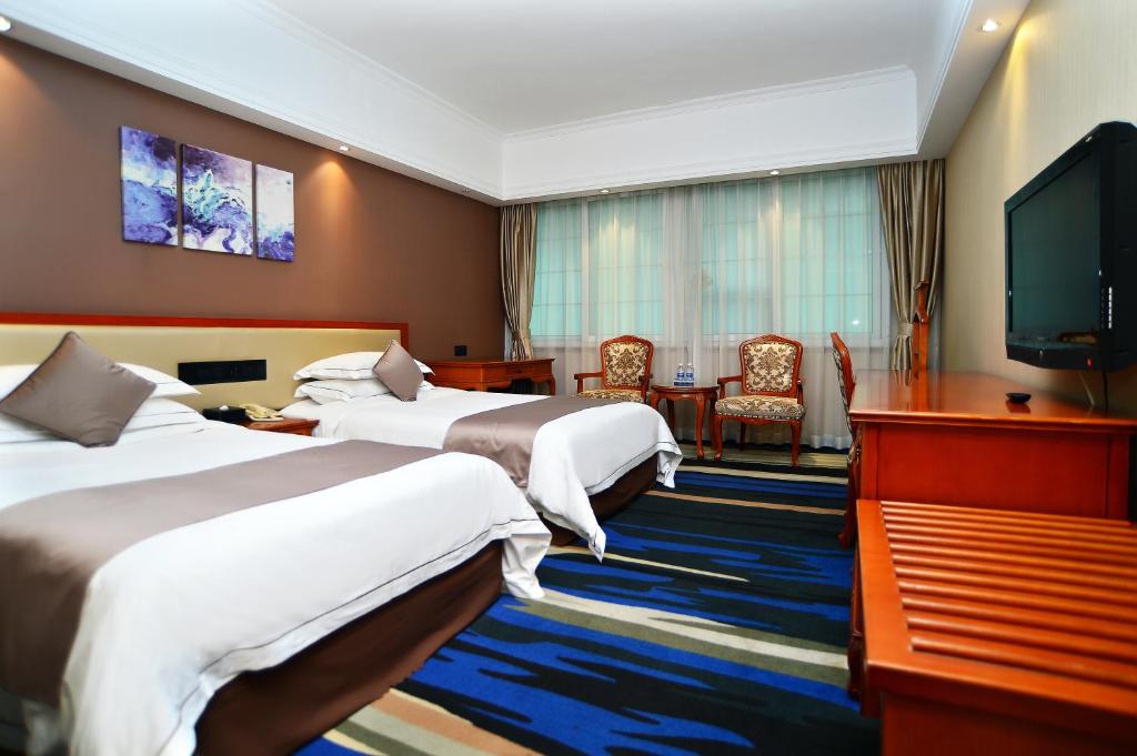 TV a/nebo společenská místnost v ubytování Shenzhen Kaili Hotel, Guomao Shopping Mall