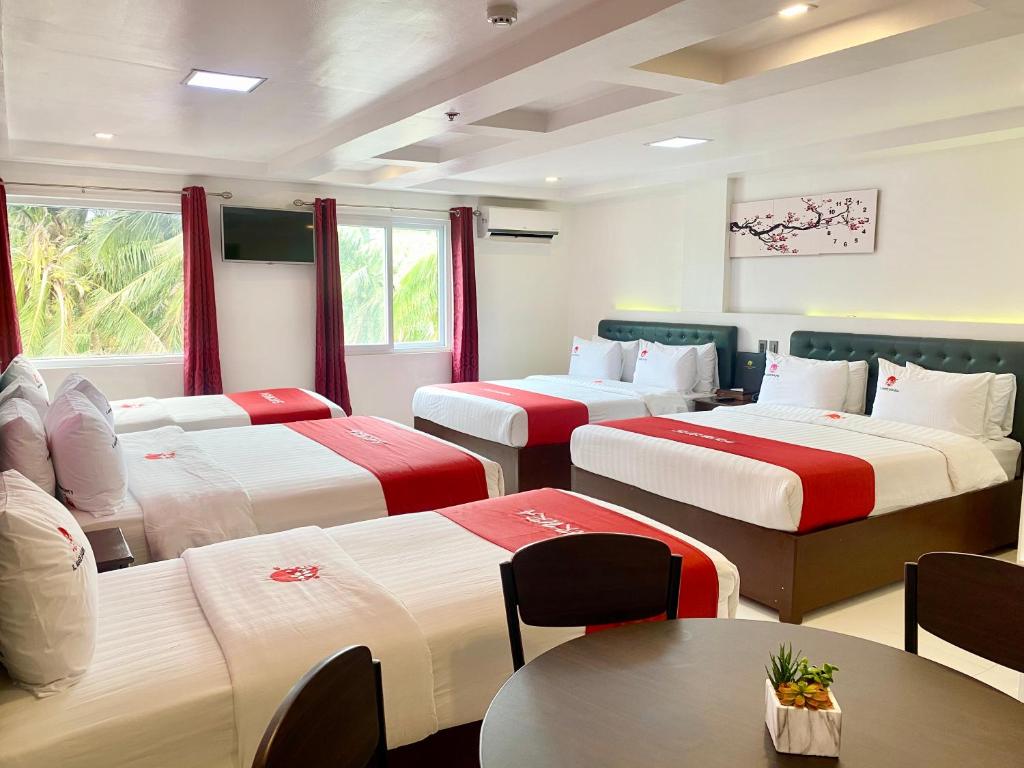 Postel nebo postele na pokoji v ubytování IL Mare Sakura Resort Boracay