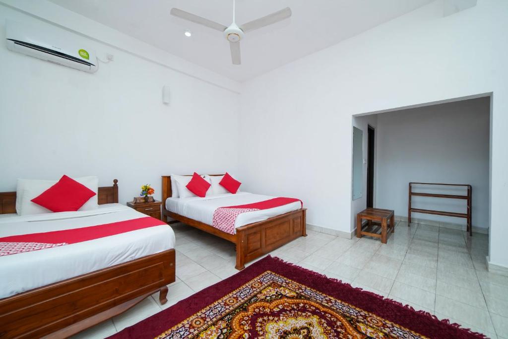 Postel nebo postele na pokoji v ubytování Dazzling Villa