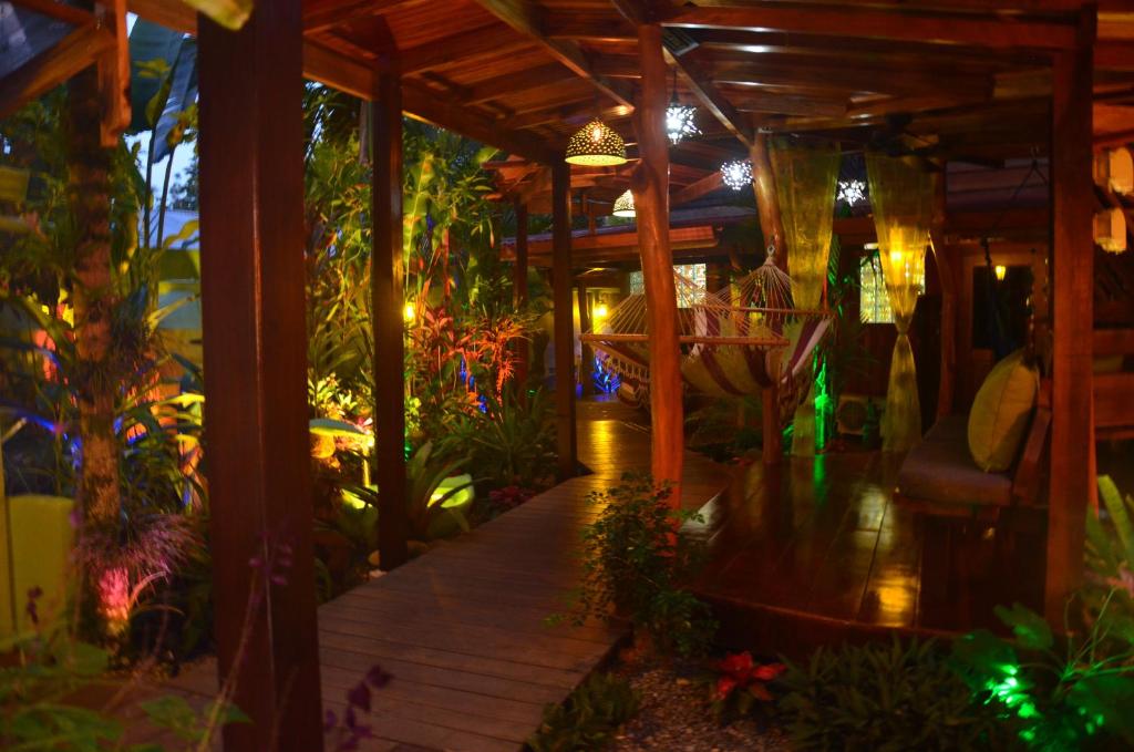 a restaurant with a lot of people in it at Physis Caribbean Bed & Breakfast in Puerto Viejo