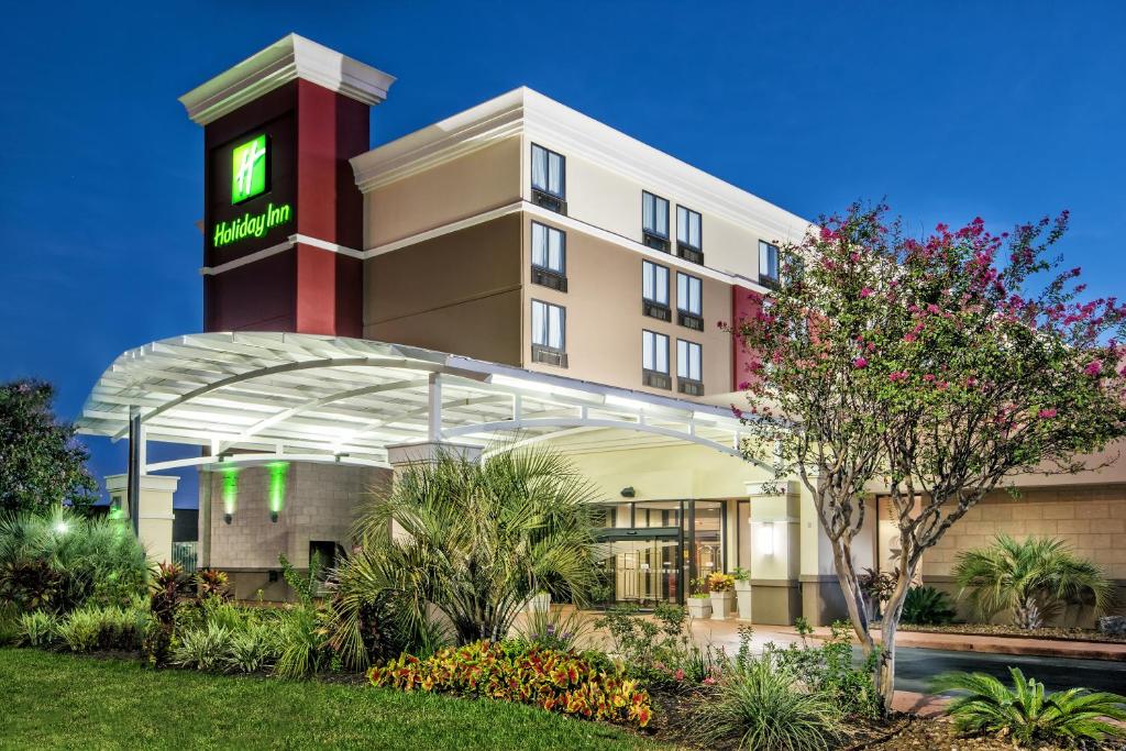 a rendering of a hotel with a clock tower at Holiday Inn Houston SW-Near Sugar Land, an IHG Hotel in Houston