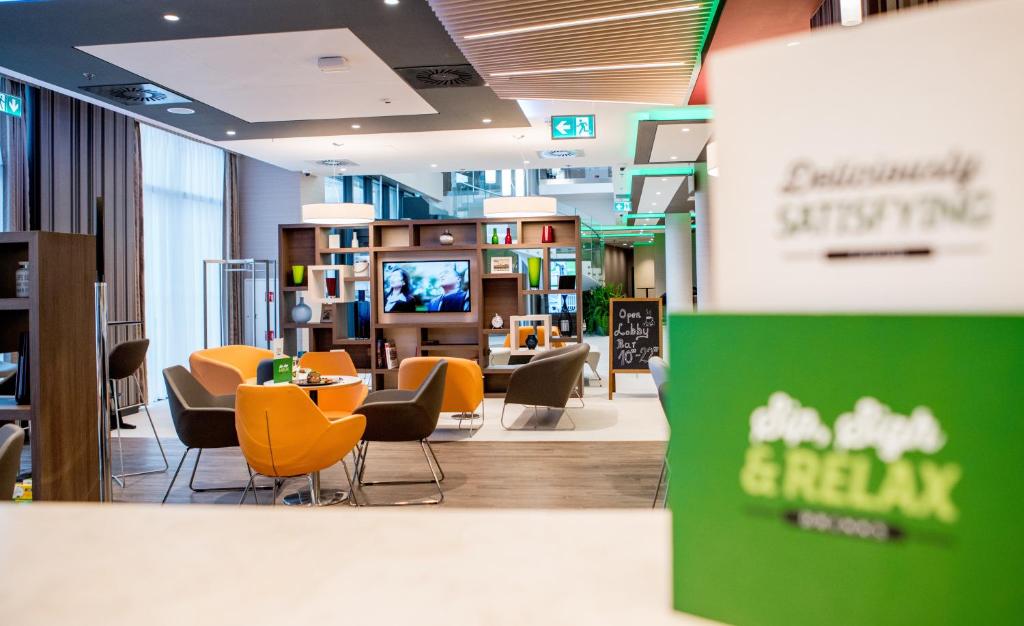 Posedenie v ubytovaní Holiday Inn Dąbrowa Górnicza-Katowice by IHG