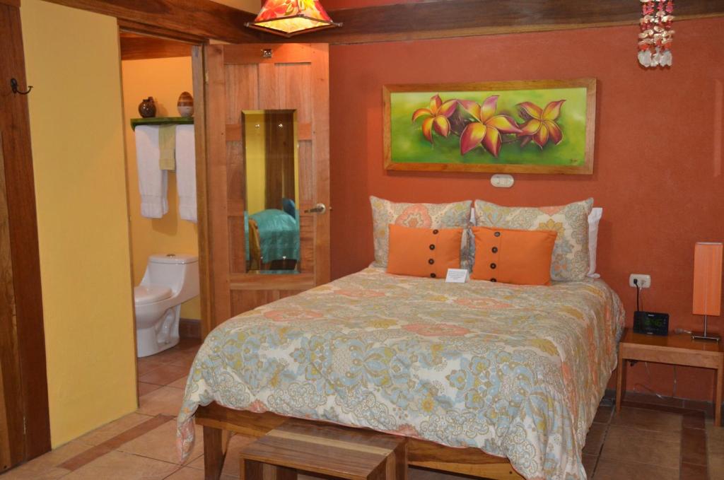 Postel nebo postele na pokoji v ubytování Physis Caribbean Bed & Breakfast
