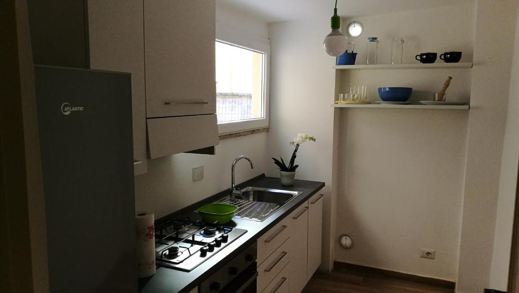 Kuchnia lub aneks kuchenny w obiekcie EApartmentsfoligno