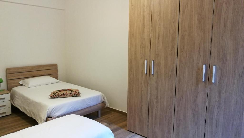 Łóżko lub łóżka w pokoju w obiekcie EApartmentsfoligno