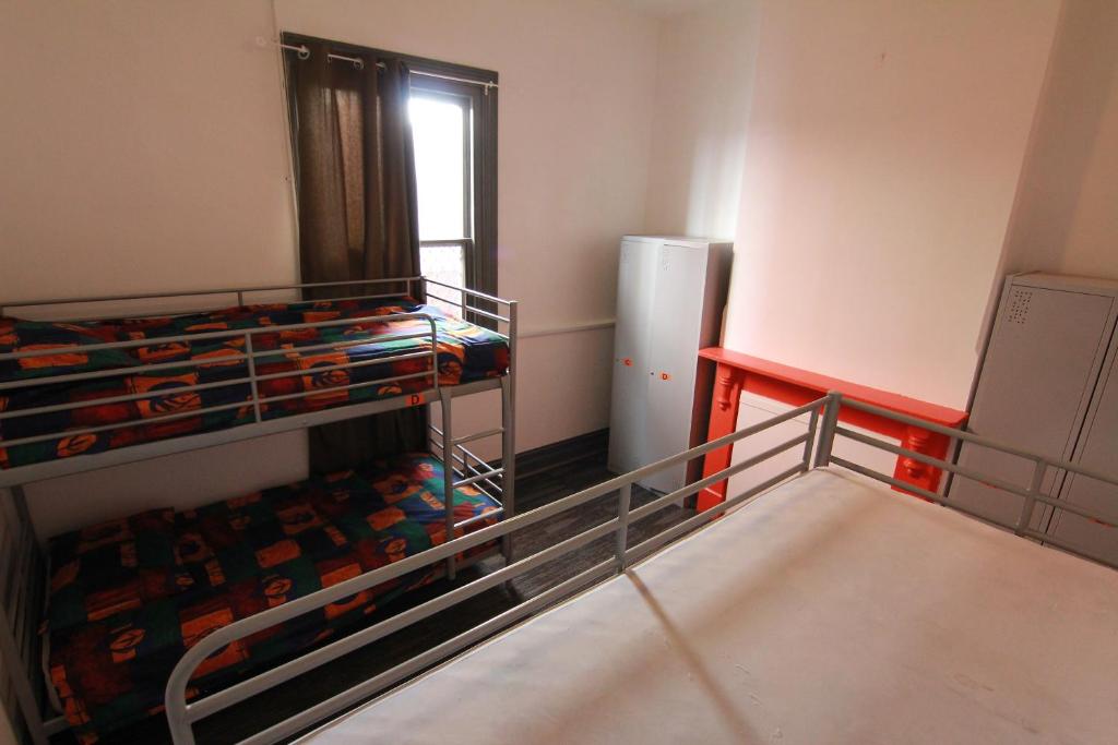 Postel nebo postele na pokoji v ubytování Haus Accommodation - note - Valid passport required to check-in