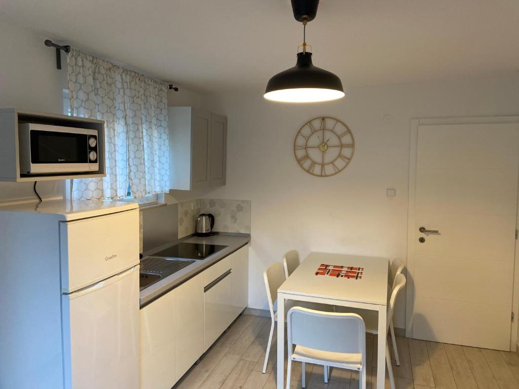 Kuchyň nebo kuchyňský kout v ubytování Holiday Home Darko