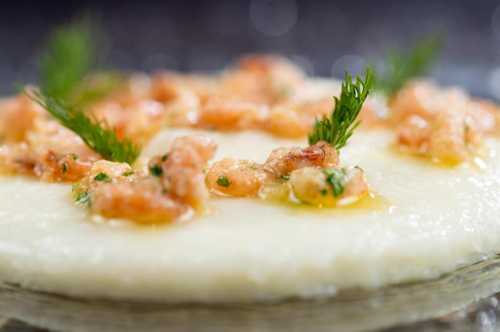 a close up of a dessert with shrimp on top at Ca' Pisani Hotel in Venice