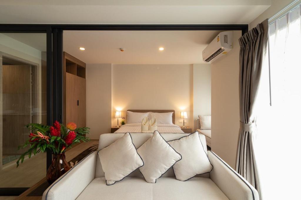 Postel nebo postele na pokoji v ubytování Hua Hin La Casita 492