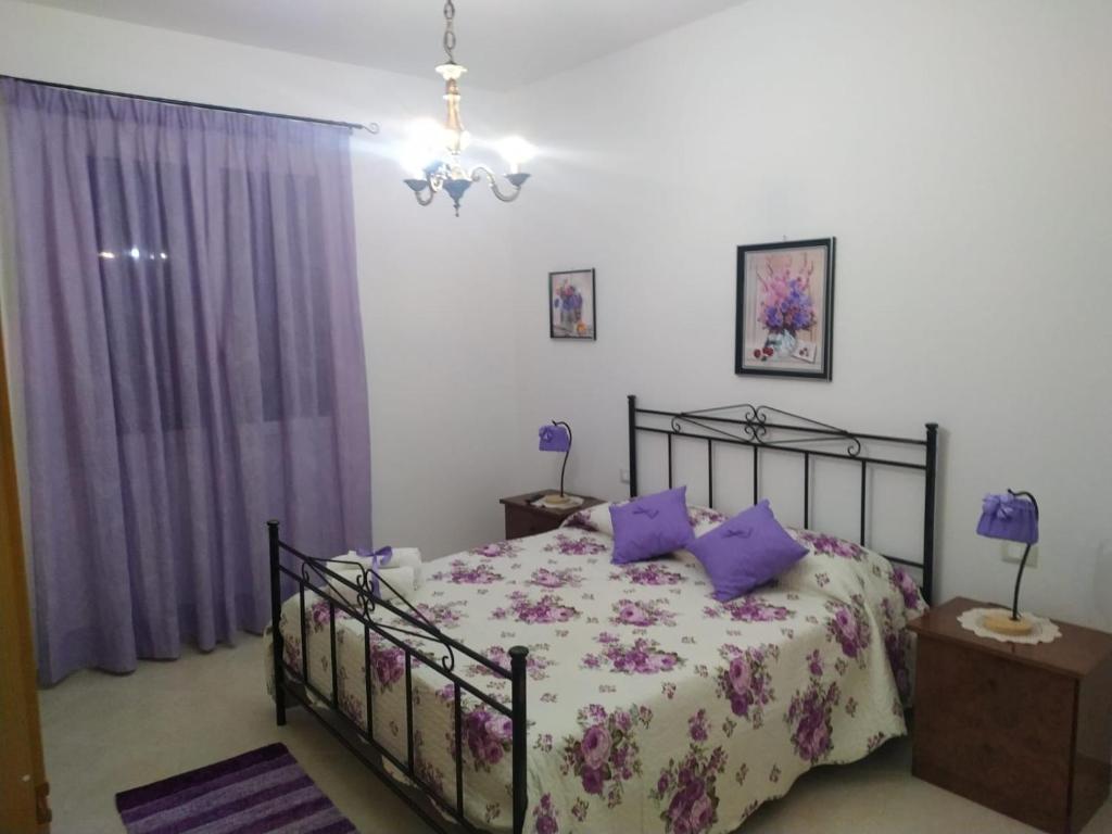 Postel nebo postele na pokoji v ubytování B&B DA FRANCESCO