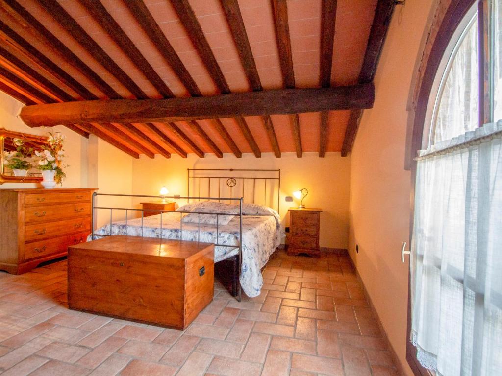 A bed or beds in a room at Holiday Home Capanna di Sopra by Interhome