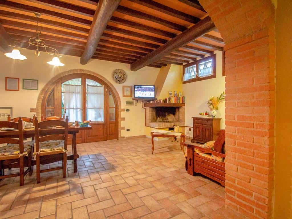 A television and/or entertainment centre at Holiday Home Capanna di Sopra by Interhome