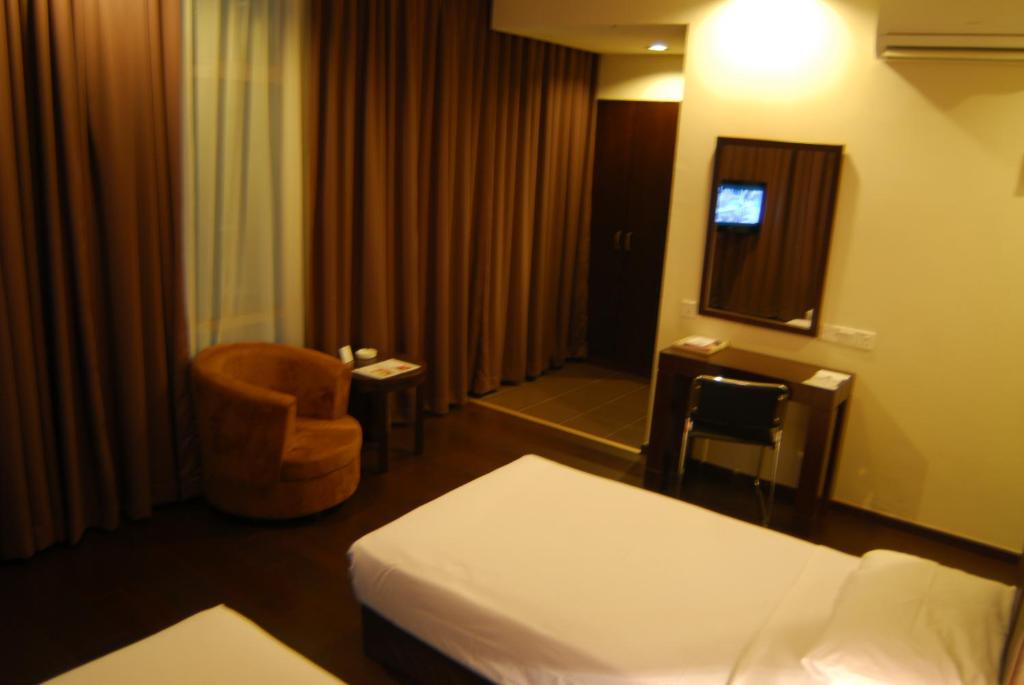Postel nebo postele na pokoji v ubytování Manja Hotel