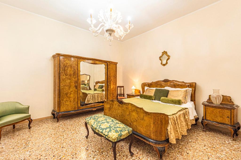 Łóżko lub łóżka w pokoju w obiekcie CASA VESCOVO, free Wi-Fi near San Marco Square