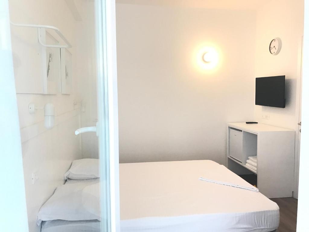 Postel nebo postele na pokoji v ubytování Aleksi rooms
