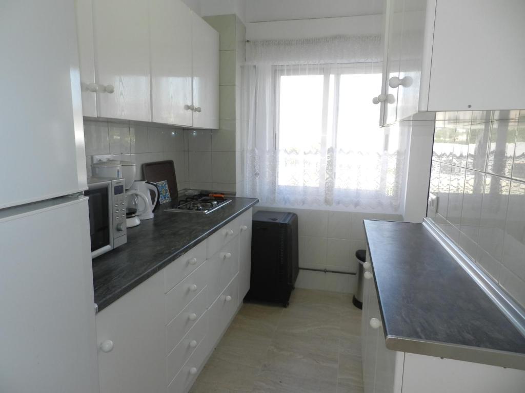 Kuchyň nebo kuchyňský kout v ubytování Apartamento Beata 4 PAX