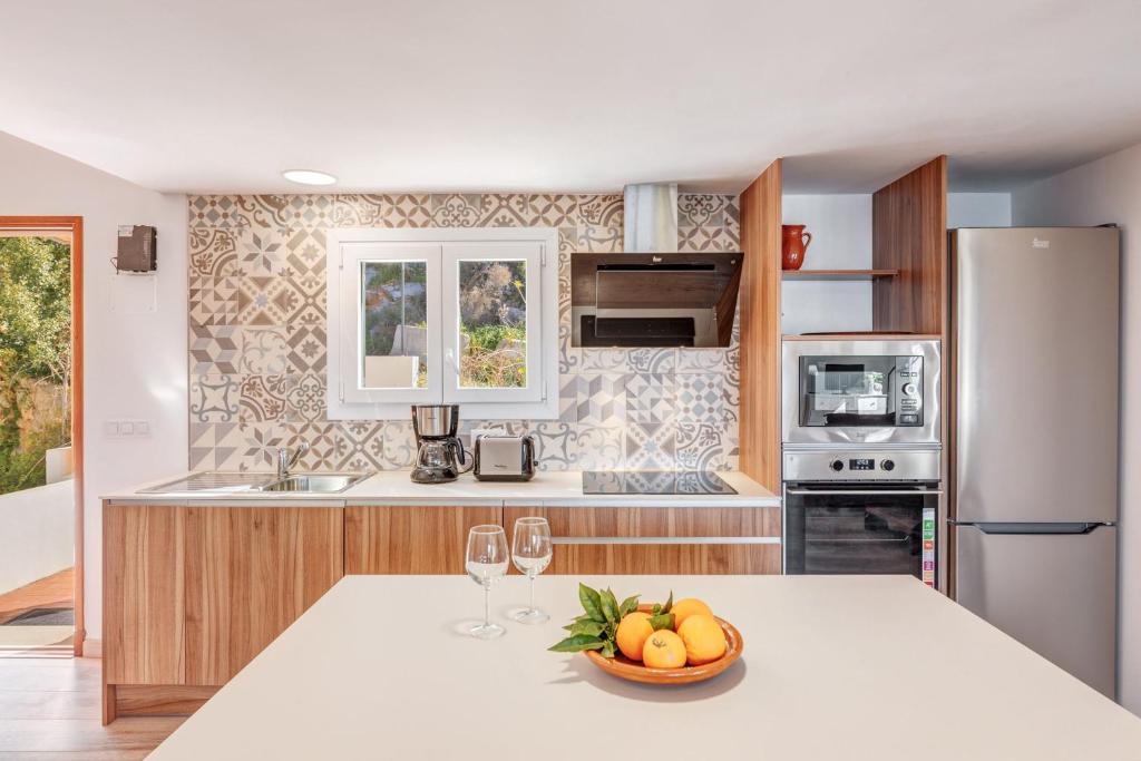 Kuchyň nebo kuchyňský kout v ubytování Villa Dos Mundos