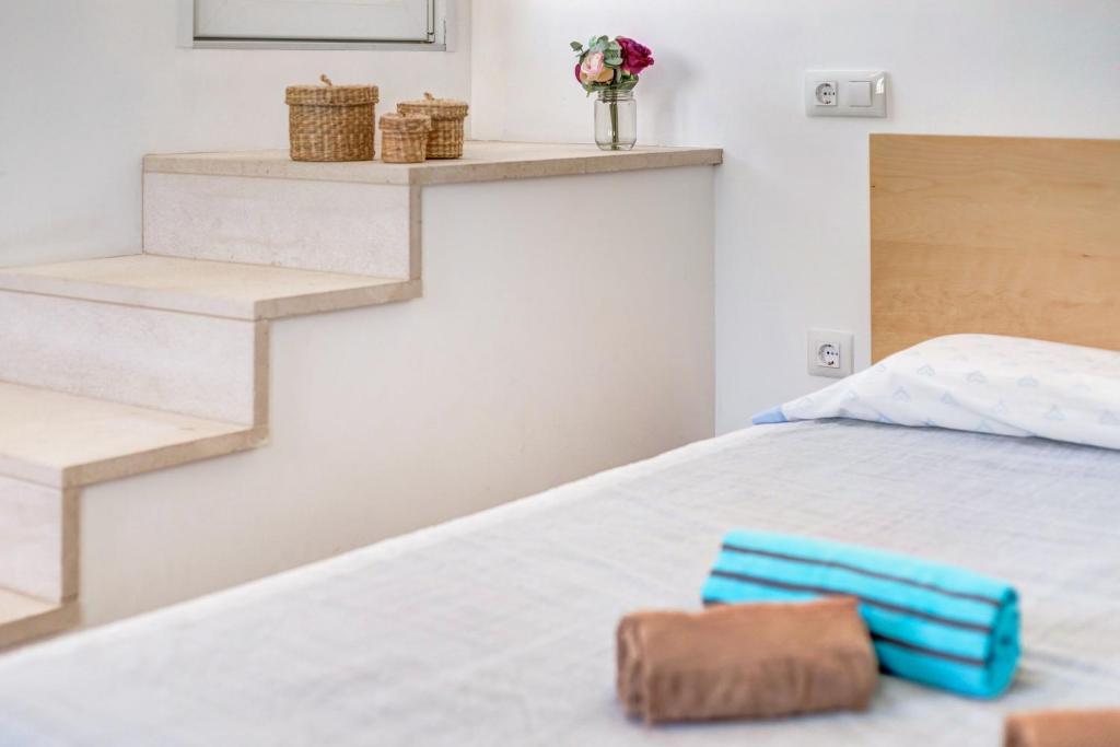 Postel nebo postele na pokoji v ubytování Villa Dos Mundos