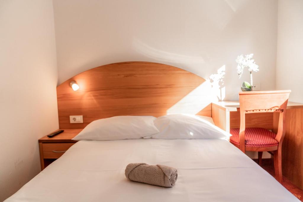 Postel nebo postele na pokoji v ubytování Hotel Medno