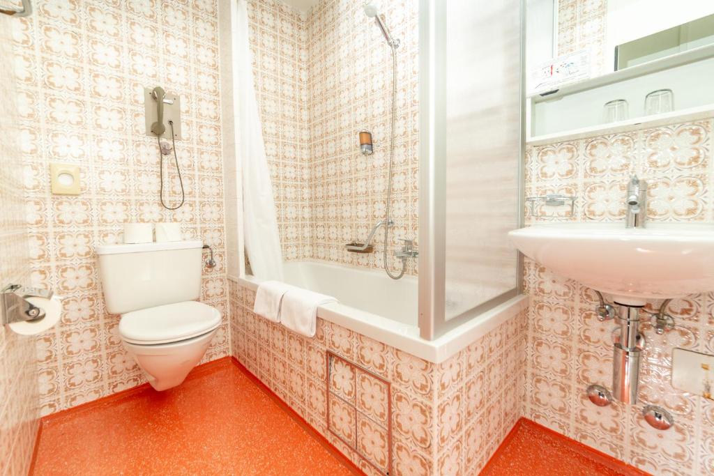 Kopalnica v nastanitvi Hotel Alexander